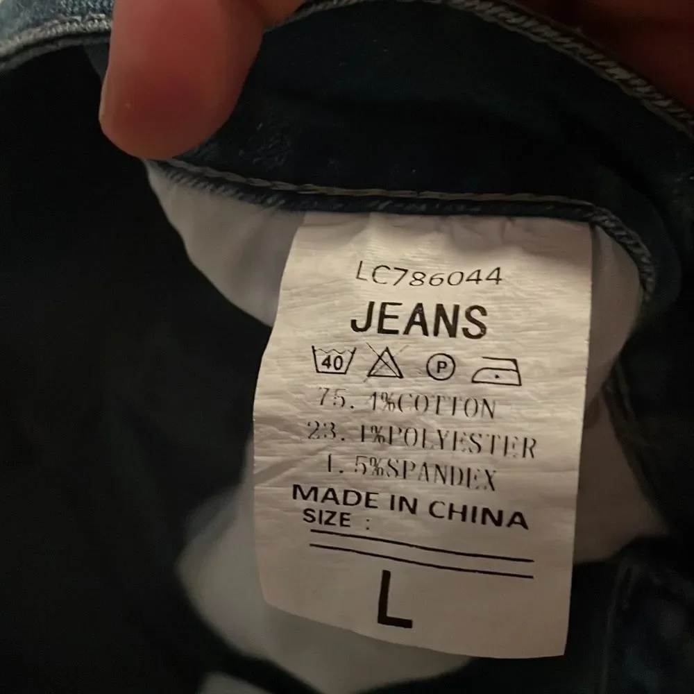 Size large cut off Jean shorts with fraying